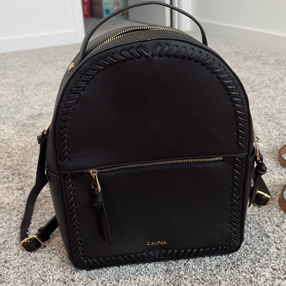 Calpak Elegant Black Backpack with Gold Accents